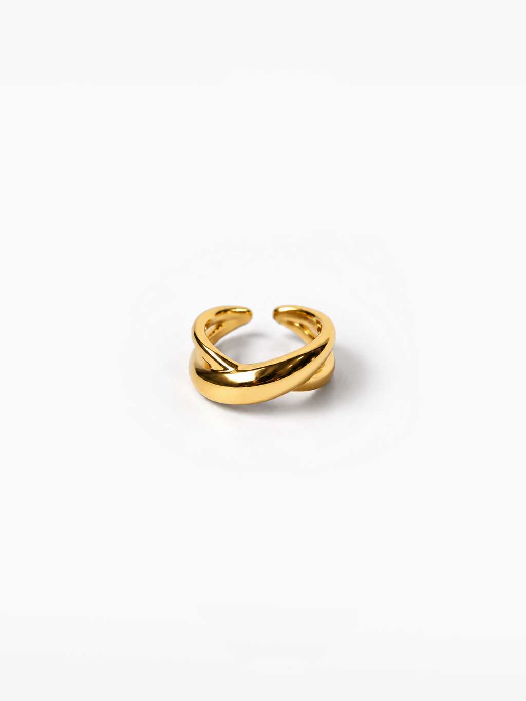 A polished gold twist ring with a smooth, glossy finish, displayed on a clean white background.