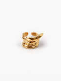 A gold-toned adjustable ring with a textured, leaf-like twisted design, photographed on a clean white background.