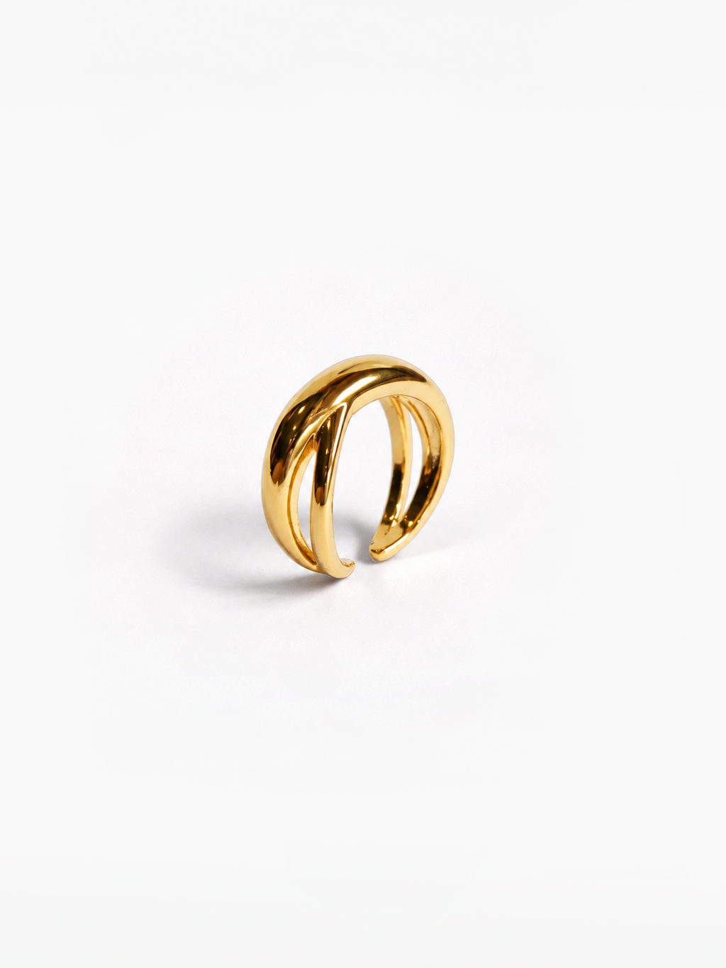 A polished gold-toned open ring with a smooth, curved double-band design, photographed on a clean white background.