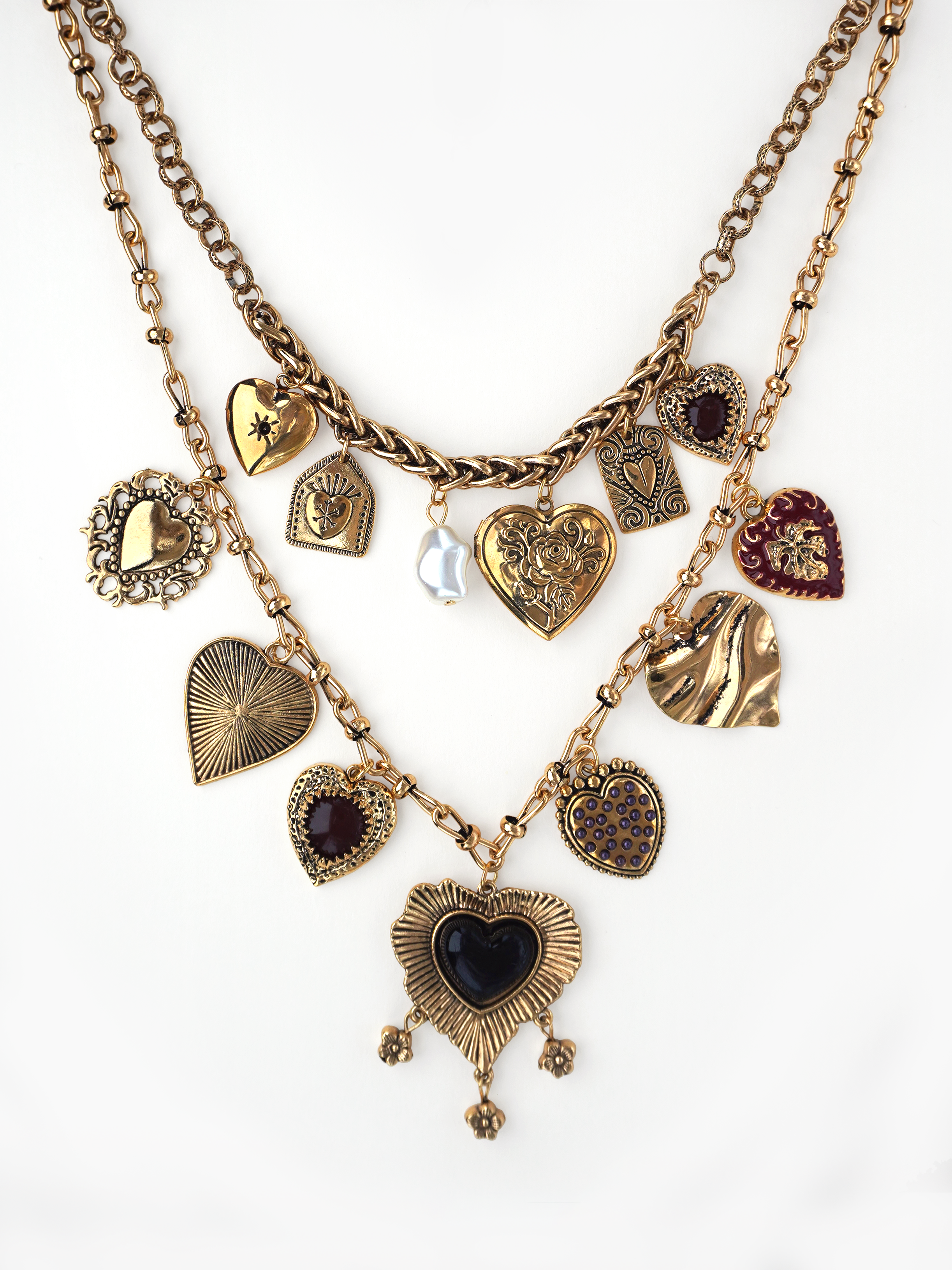 Heart of Aurelia necklace - gold multi strand chains with charms, pendants, hearts, pearls, medallions, and stones in mixed metal tones. layered necklace, chunky neckpiece by SOLÉITE