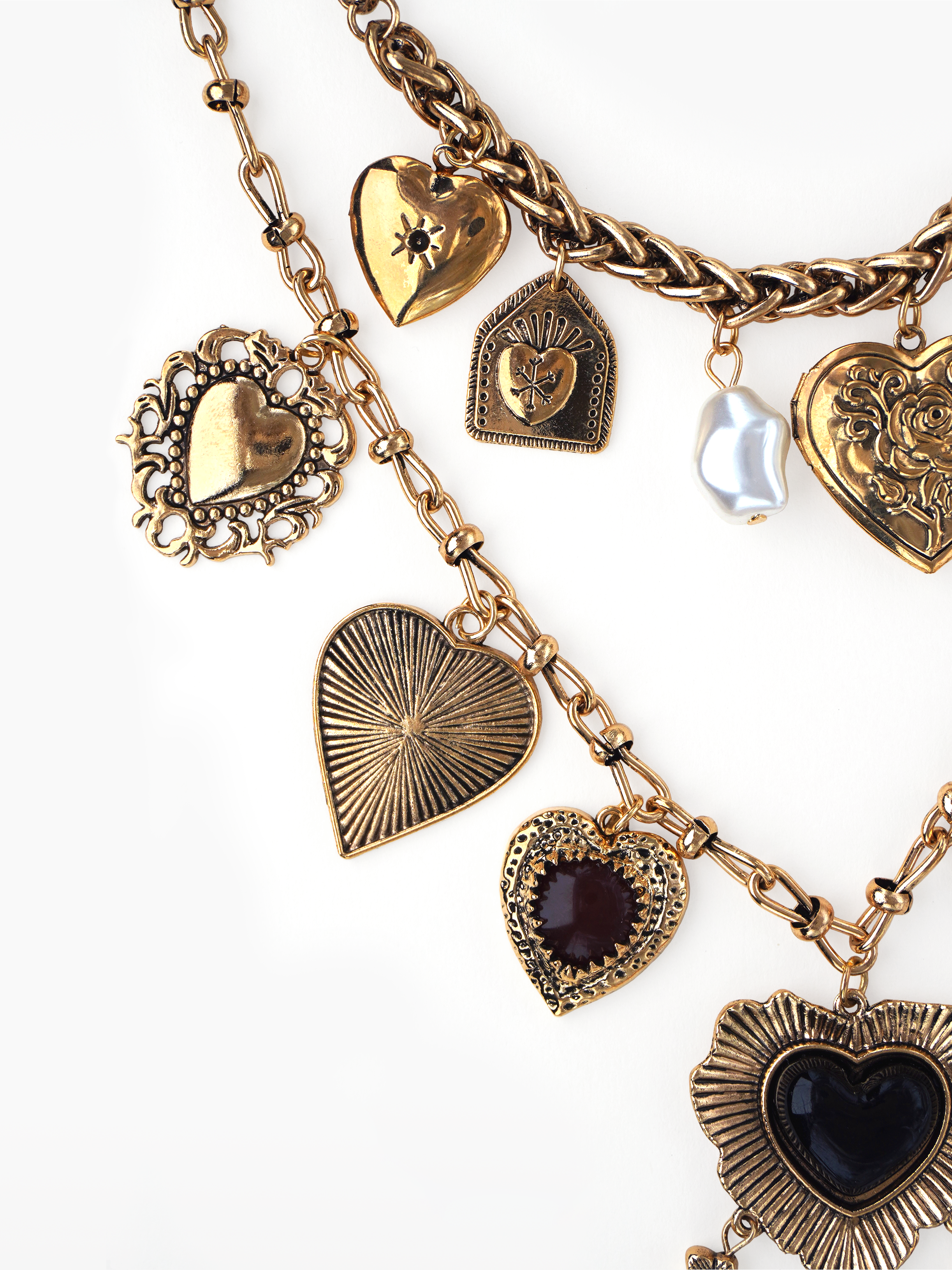 Heart of Aurelia necklace - gold multi strand chains with charms, pendants, hearts, pearls, medallions, and stones in mixed metal tones. layered necklace, chunky neckpiece by SOLÉITE